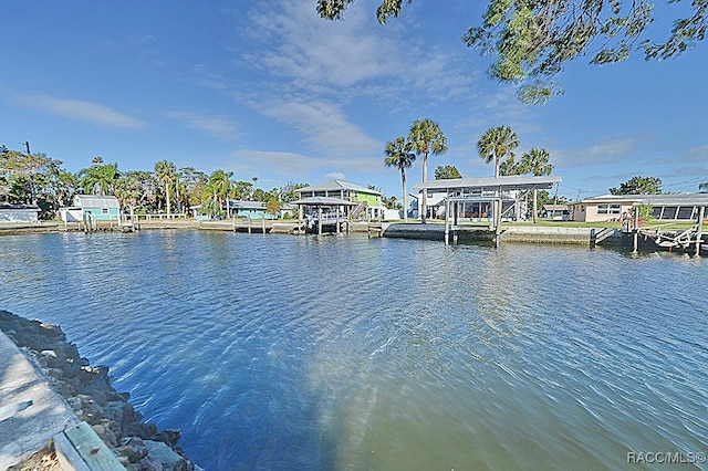 view of dock with a water view