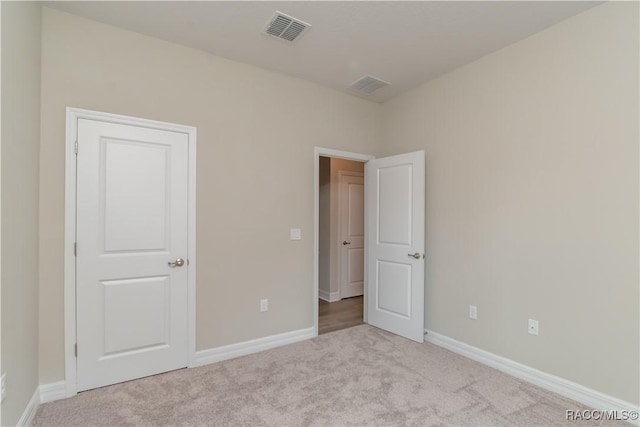 9262 N Alpinia Dr, Citrus Springs, FL 34434 - unfurnished bedroom with carpet and baseboards