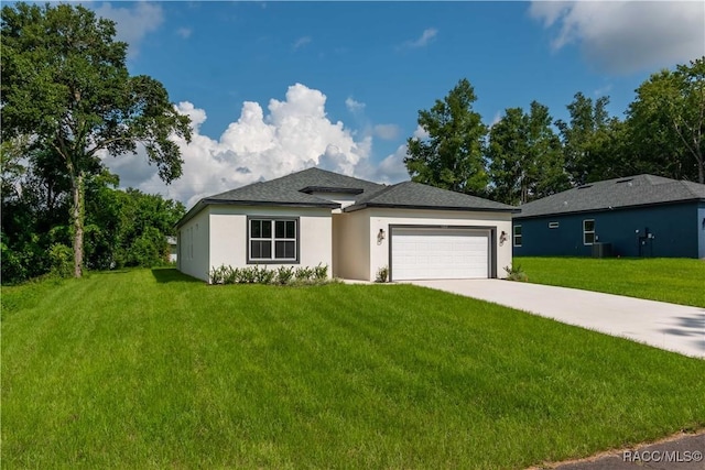 9262 N Alpinia Dr, Citrus Springs, FL 34434 - view of front facade with a front yard, a garage, stucco siding, and driveway