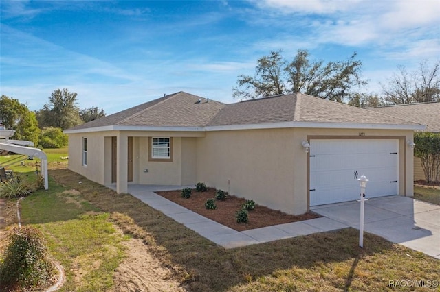 single story home with a garage, driveway, a shingled roof, and stucco siding