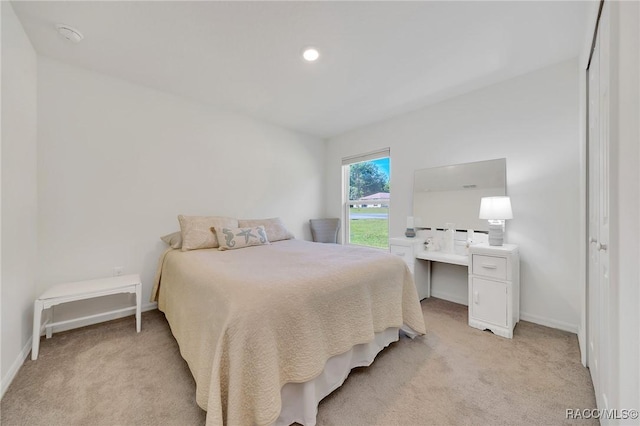 1435 W Adele Ct, Citrus Springs, FL 34434 - bedroom featuring light carpet and baseboards