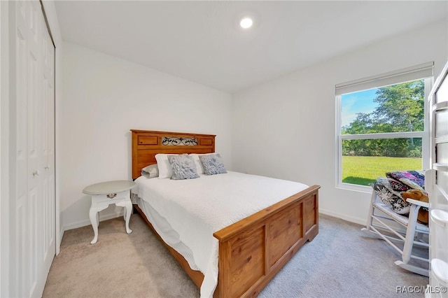 1435 W Adele Ct, Citrus Springs, FL 34434 - bedroom with light colored carpet and baseboards