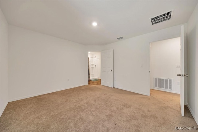 1435 W Adele Ct, Citrus Springs, FL 34434 - unfurnished bedroom featuring light carpet, baseboards, connected bathroom, and recessed lighting