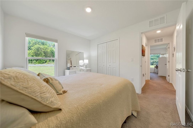 1435 W Adele Ct, Citrus Springs, FL 34434 - bedroom with light colored carpet, a closet, baseboards, and recessed lighting