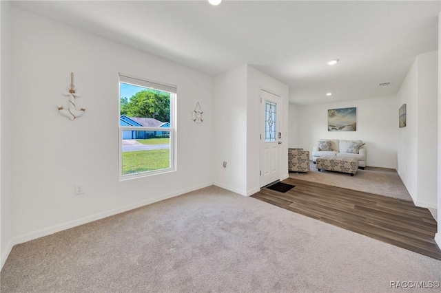 1435 W Adele Ct, Citrus Springs, FL 34434 - entrance foyer featuring baseboards, recessed lighting, and carpet floors