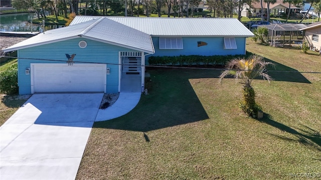 ranch-style home with a water view and a front lawn