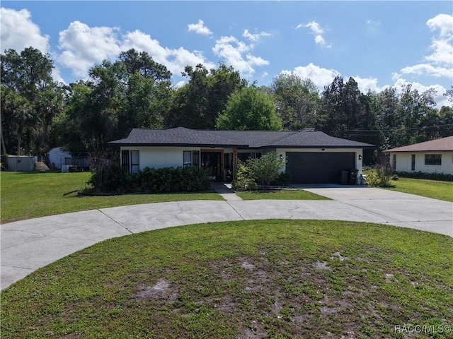 ranch-style home featuring driveway, a front yard, stucco siding, and a garage
