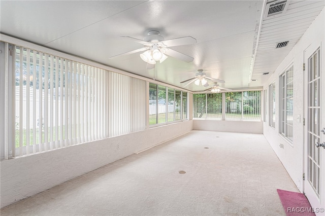 unfurnished sunroom featuring a healthy amount of sunlight