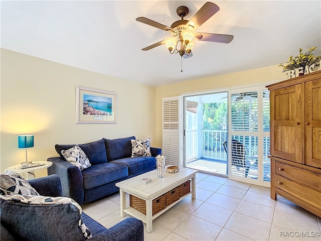 living room featuring ceiling fan and light tile patterned floors