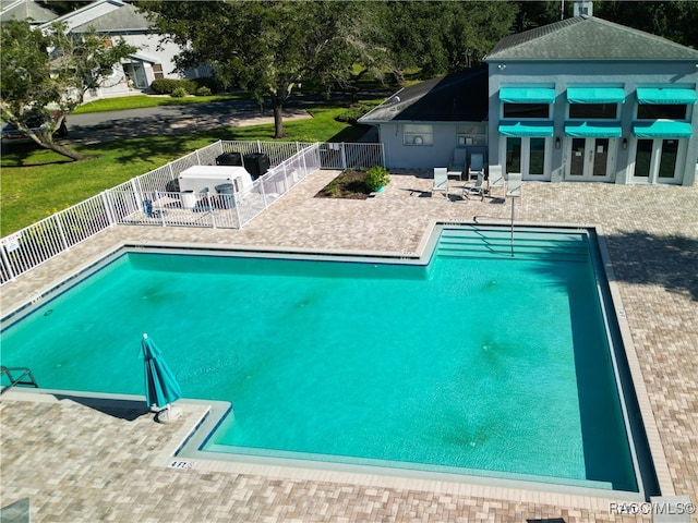 view of pool featuring a patio area