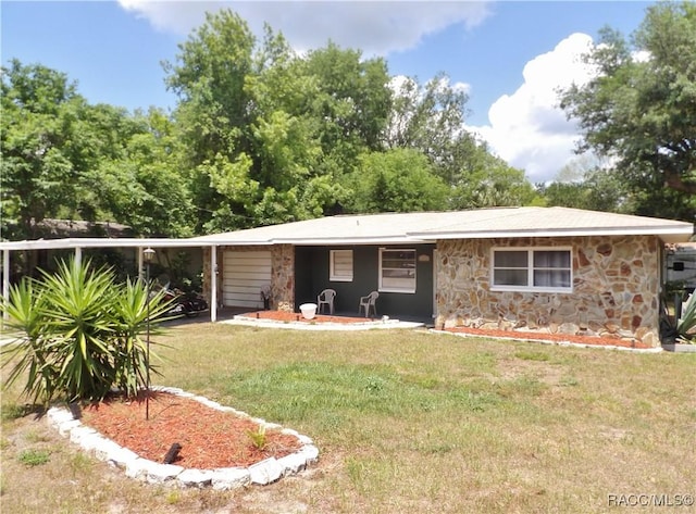 127 N Braemar Dr, Inverness, FL 34450 - single story home featuring stone siding and a front lawn