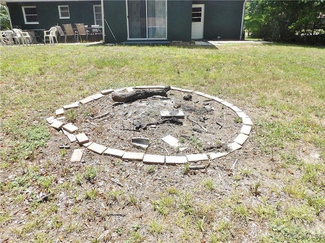 127 N Braemar Dr, Inverness, FL 34450 - view of yard featuring an outdoor fire pit