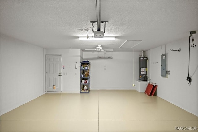 garage with a garage door opener, ceiling fan, electric panel, and water heater