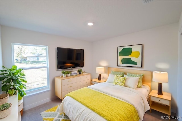 7235 N Glenridge Cir, Citrus Springs, FL 34433 - bedroom with baseboards and carpet flooring