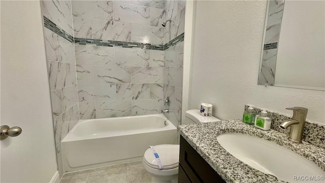 bathroom with a textured wall,  shower combination, vanity, and toilet