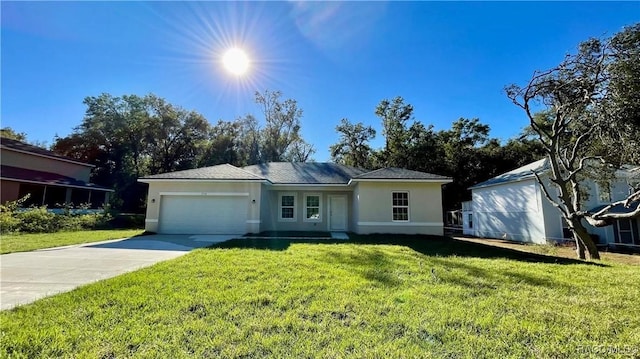 ranch-style home with a front yard, driveway, an attached garage, and stucco siding