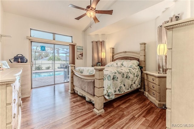 bedroom with vaulted ceiling, dark wood-type flooring, access to exterior, and ceiling fan