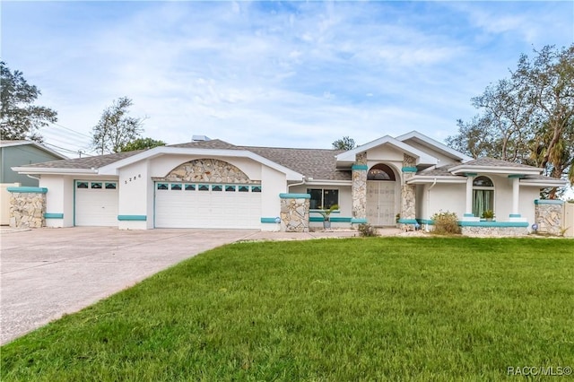 ranch-style home with a garage and a front lawn