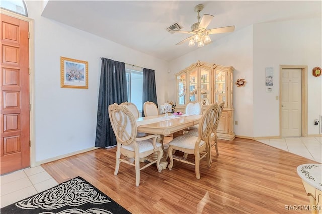 dining area featuring light hardwood / wood-style floors and ceiling fan