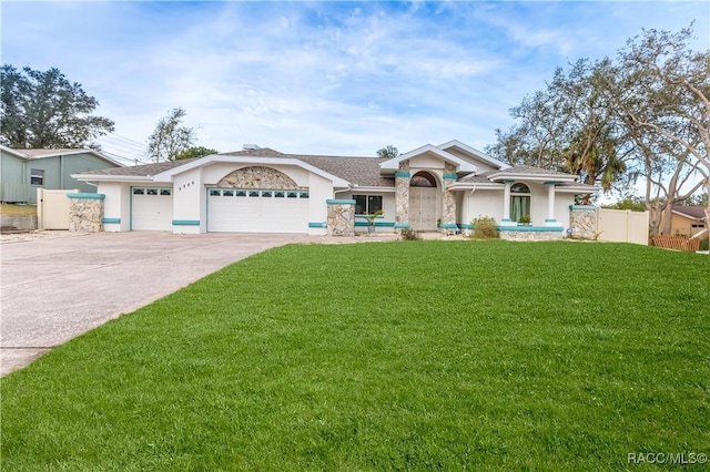 ranch-style house with a garage and a front yard