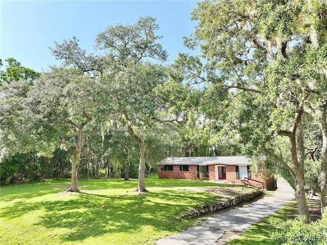 view of front of house with a front lawn