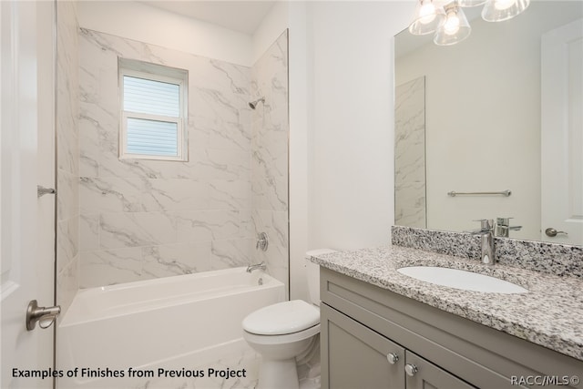 full bathroom with vanity, toilet, and tiled shower / bath