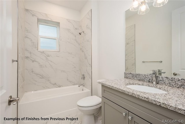 full bathroom featuring vanity, toilet, and tiled shower / bath