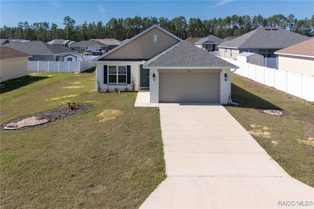 view of front facade with a garage and a front lawn