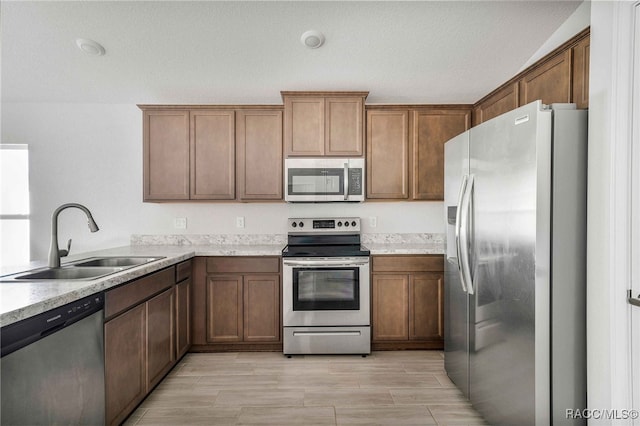 kitchen featuring sink and appliances with stainless steel finishes