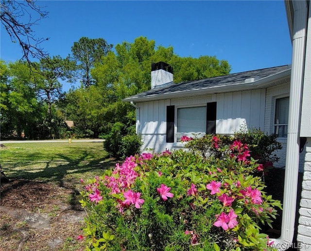 exterior space with a yard