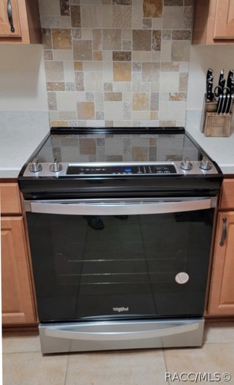 room details featuring stainless steel electric range