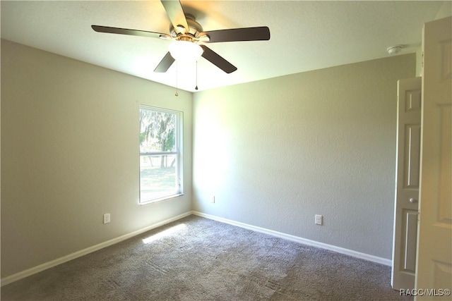 11609 SW 59th Ter, Ocala, FL 34476 - unfurnished room with carpet flooring, a ceiling fan, baseboards, a smoke detector, and a textured wall