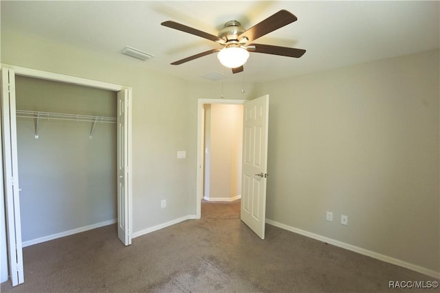 11609 SW 59th Ter, Ocala, FL 34476 - unfurnished bedroom with carpet flooring, a closet, baseboards, and ceiling fan