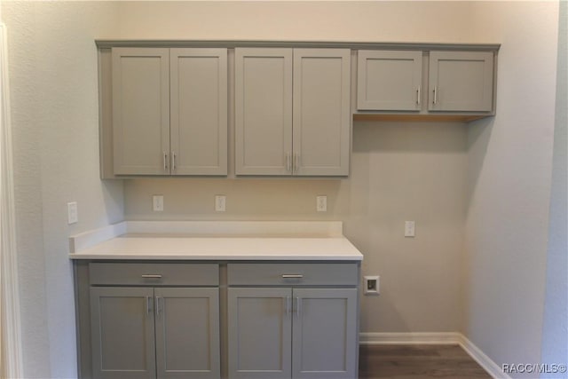11609 SW 59th Ter, Ocala, FL 34476 - kitchen featuring gray cabinetry, baseboards, light countertops, and dark wood finished floors