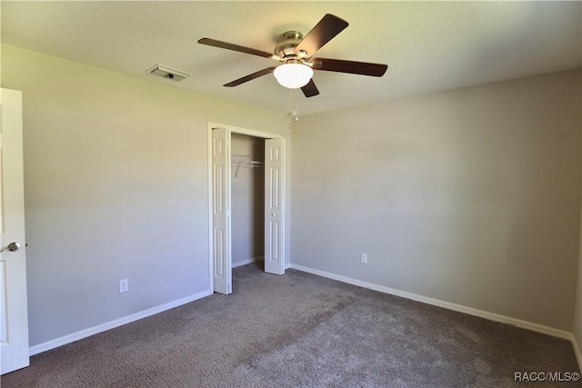 11609 SW 59th Ter, Ocala, FL 34476 - unfurnished bedroom with carpet, a closet, baseboards, and ceiling fan