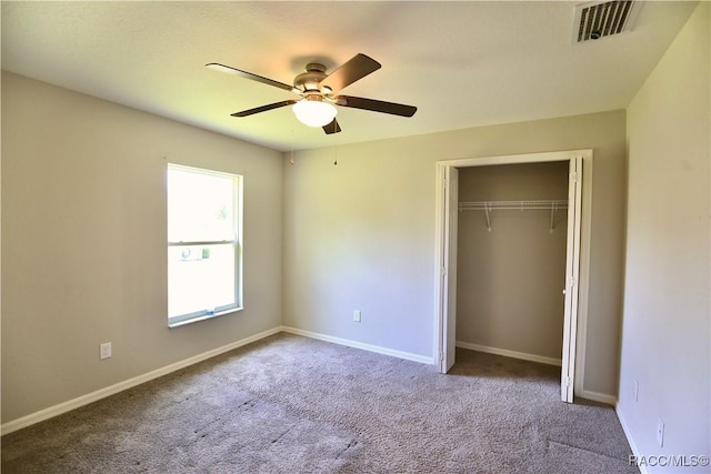 11609 SW 59th Ter, Ocala, FL 34476 - unfurnished bedroom with carpet floors, a closet, baseboards, and ceiling fan