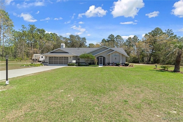 single story home with an attached garage, concrete driveway, and a front lawn