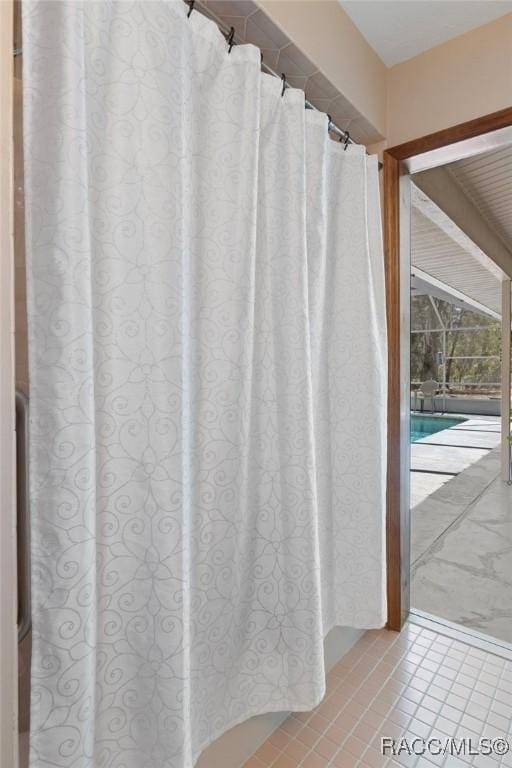 bathroom featuring tile patterned flooring