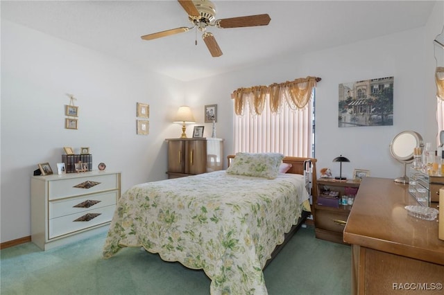 bedroom featuring carpet flooring and a ceiling fan