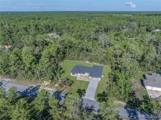 5898 N Flagstaff Ave, Beverly Hills, FL 34465 - aerial view of property and surrounding area with a heavily wooded area