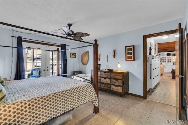 bedroom featuring light tile patterned floors, ceiling fan, access to exterior, a textured ceiling, and french doors