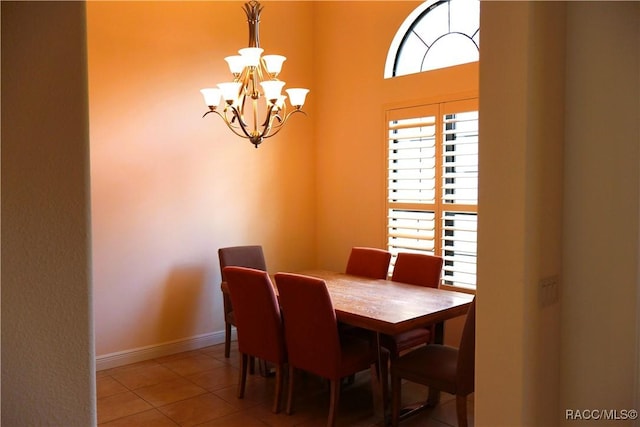 1366 N Bellamy Pt, Hernando, FL 34442 - dining space with an inviting chandelier, baseboards, and tile patterned flooring