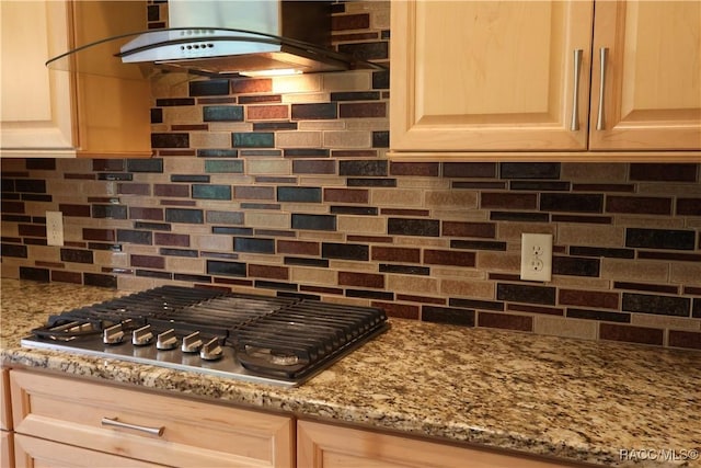 1366 N Bellamy Pt, Hernando, FL 34442 - kitchen with stainless steel gas cooktop, light brown cabinets, light stone countertops, ventilation hood, and tasteful backsplash