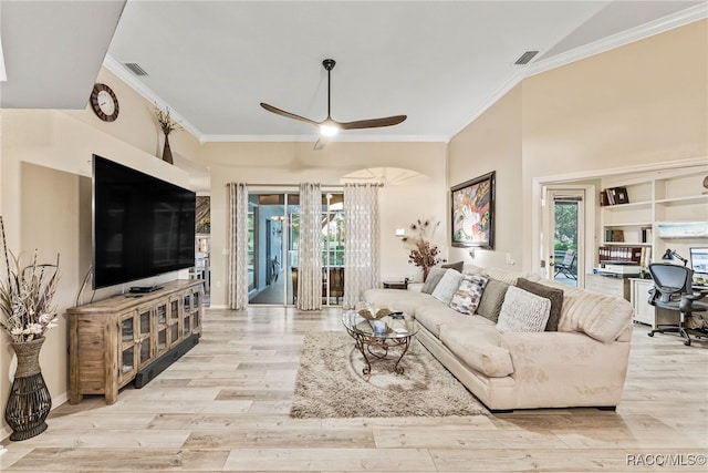 living area with crown molding, ceiling fan, visible vents, and wood finished floors