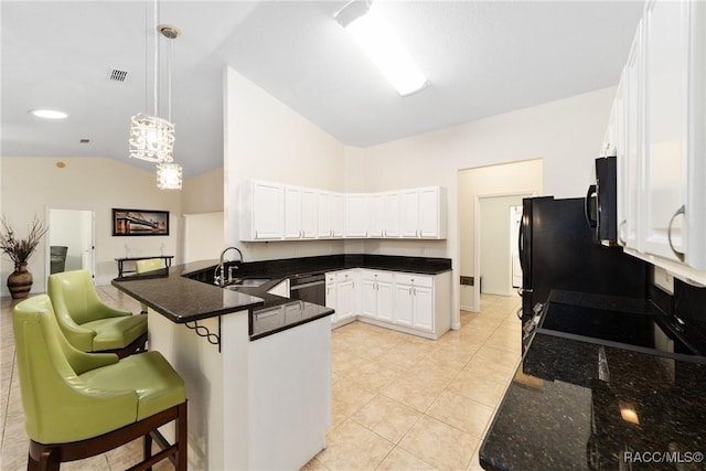 kitchen featuring a kitchen bar, decorative light fixtures, kitchen peninsula, white cabinets, and black appliances