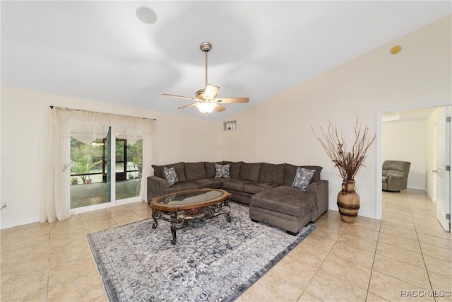 tiled living room with ceiling fan and lofted ceiling