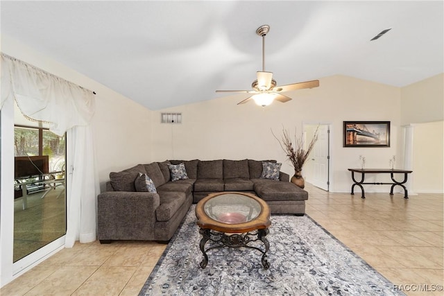 living room with light tile patterned floors, vaulted ceiling, and ceiling fan