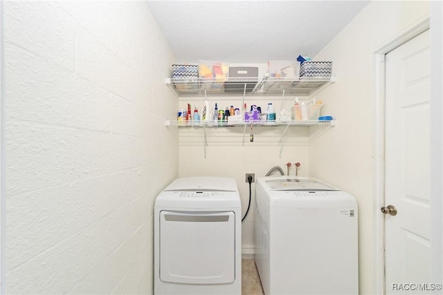 laundry area featuring independent washer and dryer