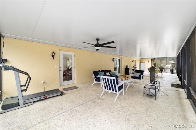 view of patio featuring an outdoor living space and ceiling fan