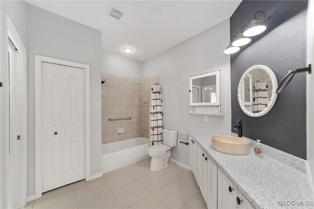 902 W Silver Meadow Loop, Hernando, FL 34442 - full bathroom with vanity, tile patterned flooring, shower / bath combination with curtain, toilet, and baseboards
